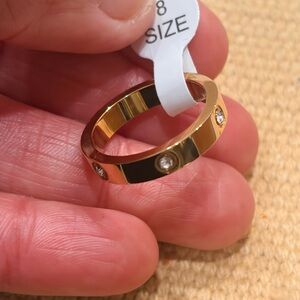 Gold Tone Women’s Band Ring with Clear Stones